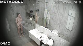 Skinny brunette relaxing in the shower stall, look