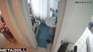 Brunette drinking coffee and peeing at the same time