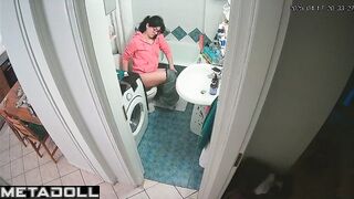 Serious phone conversation on the toilet, solo scene