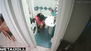 Serious phone conversation on the toilet, solo scene