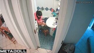 Something amused her while she was sitting on the toilet