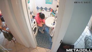 Lady's sitting on the toilet in funny pajamas, look