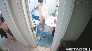 She enjoys taking a break from her family in the bathroom