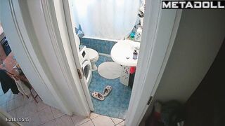 She enjoys taking a break from her family in the bathroom