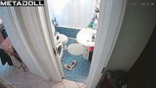 She enjoys taking a break from her family in the bathroom