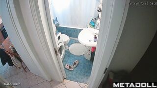 She enjoys taking a break from her family in the bathroom