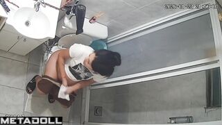 Solo toilet scene - pregnant babe's being watched and she doesn't know it