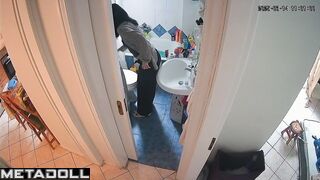 Solo bathroom scene - babe's being watched and she doesn't know it