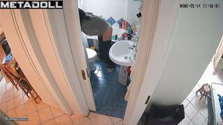 Solo bathroom scene - babe's being watched and she doesn't know it
