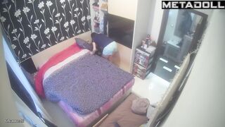 Brunette making her bed right now - hidden camera