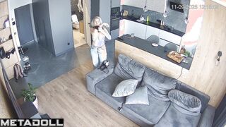 Blonde's changing her t-shirt and someone is watching her tits