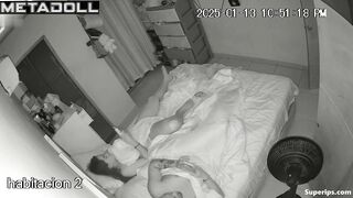 A naked man distracts his wife from her phone so they can have sex