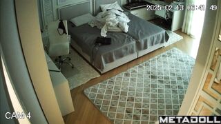 While changing clothes, the girl showed her small tits to a hidden camera