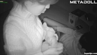 A guy caresses the hairy, wet pussy of a young Asian girl with his hand