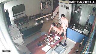 A sexy brunette gives her husband a blowjob right at the dining table