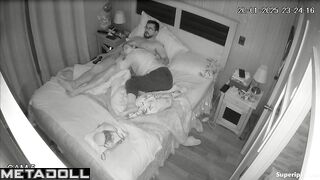 A bored blonde tries to pull down her husband's boxers to get to his dick