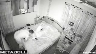 A long-haired brunette brings her husband to orgasm by jerking him off