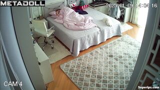 A bored beauty in bed caresses herself under the covers