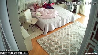 A bored beauty in bed caresses herself under the covers