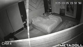 A young brunette writhes in ecstasy during her evening masturbation session