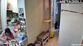 A chubby Asian girl walks around the apartment without panties