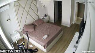 A beautiful girl gives a gentle blowjob to a bearded man while he undresses