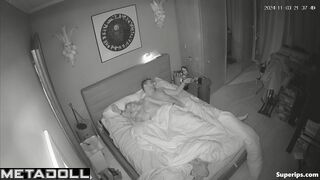 Husband plays with his wife's breasts while she reaches for his cock