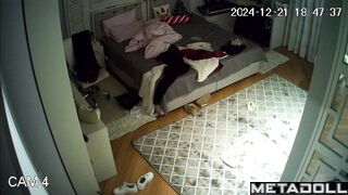 A young student walks around the room with her bare tits without a bra