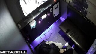 Young Asians are caressing each other while locked in a karaoke room