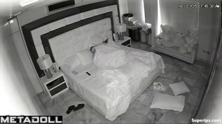 A seductive young girl grabs her husband's big penis as he gets into bed