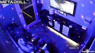 A guy is trying to sing karaoke while a cute Asian girl gives him a blowjob