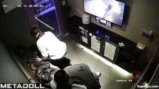 A guy is trying to sing karaoke while a cute Asian girl gives him a blowjob