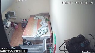Cute mommy doesn't know that a hidden camera is filming her naked tits