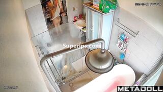 A chubby brunette caresses her hot pussy under the shower stream