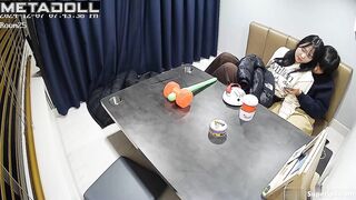 A young Asian girl enjoys her boyfriend secretly caressing her hot pussy