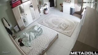 The man takes out a condom while his wife gives him a blowjob