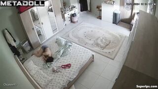 The man takes out a condom while his wife gives him a blowjob