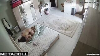 The man takes out a condom while his wife gives him a blowjob
