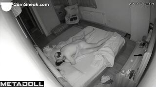 A balding husband tenderly makes love to his beautiful young wife