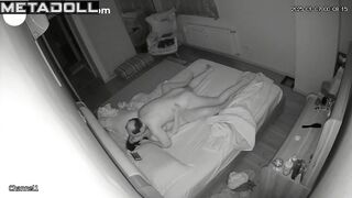 A balding husband tenderly makes love to his beautiful young wife