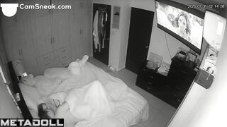 A tattooed girl gently strokes the face of her boyfriend as he fucks her